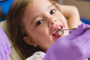 checking child's gums