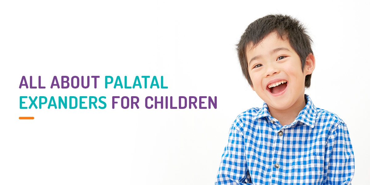 boy smiling showing how palatal expanders are good for children